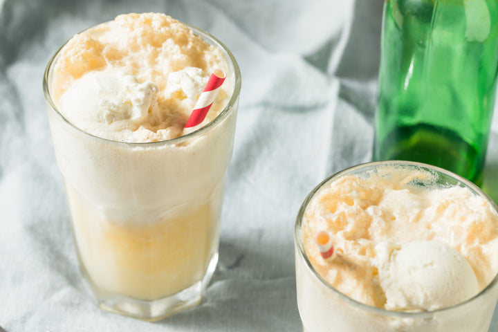 Peach tea vanilla float, Two Leaves and a Bud, two glasses topped with ice cream