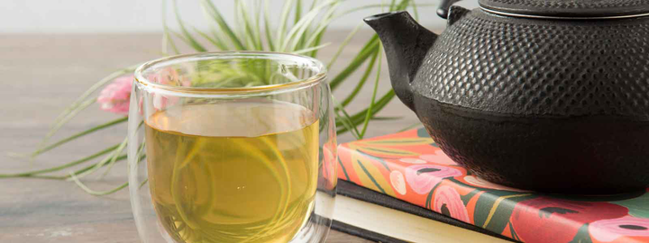Green Tea with black tea kettle